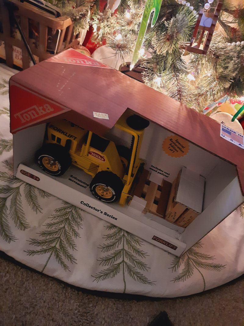 Tonka toy under Christmas tree XMAS